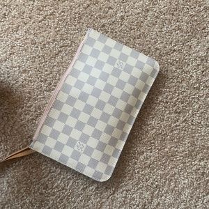 Authentic Louis Vuitton pouch from never full
